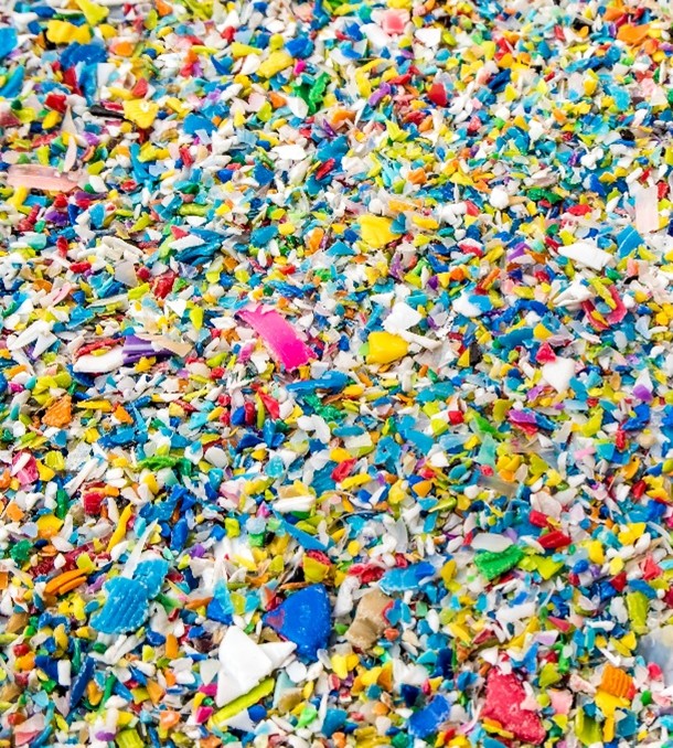 Colorful HDPE plastic flakes after shredding